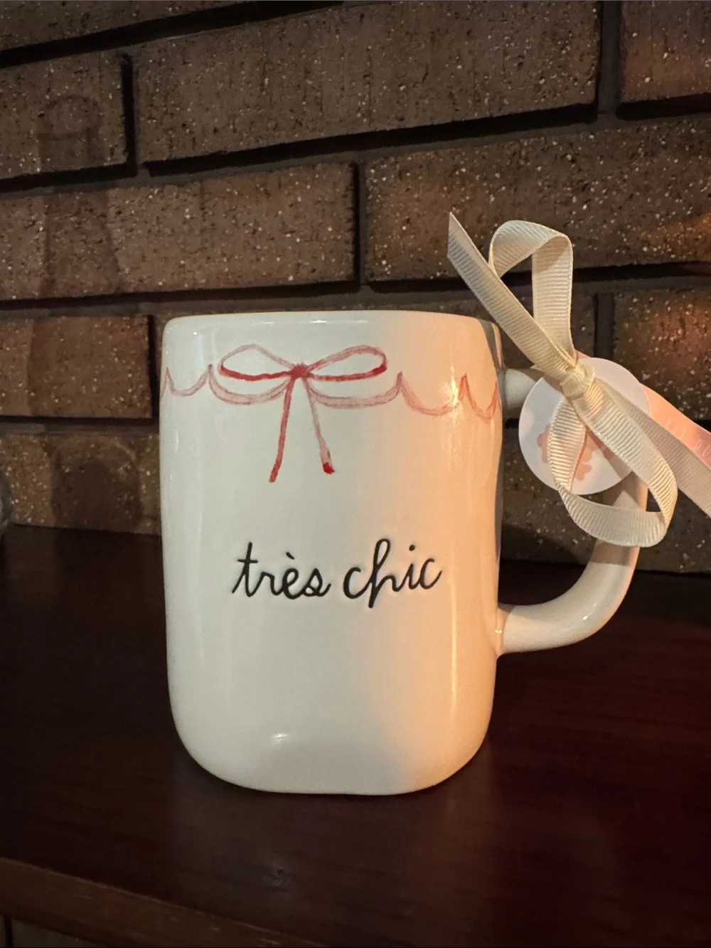 Rae Dunn White Ceramic Mug with Black Script and Pale Pink Bow - Picture 1 of 4